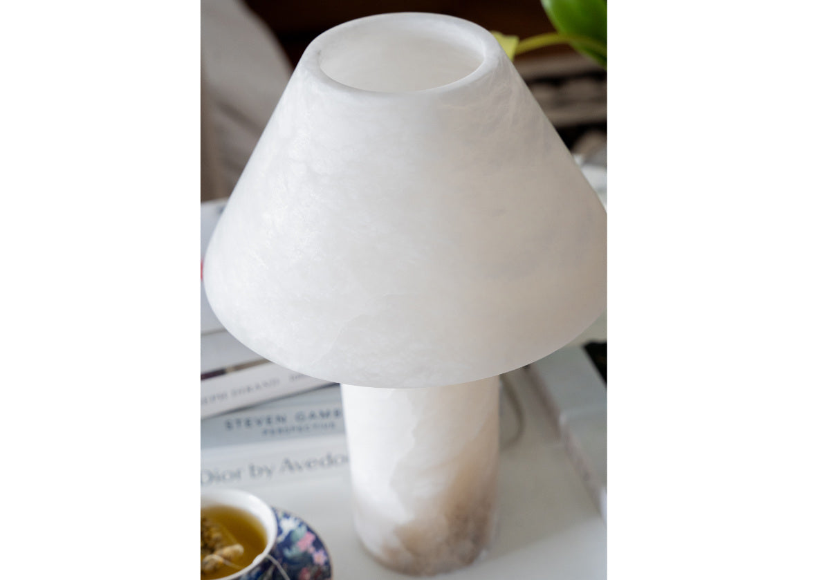 lifestyle photo of athena lamp top of shade facing down.