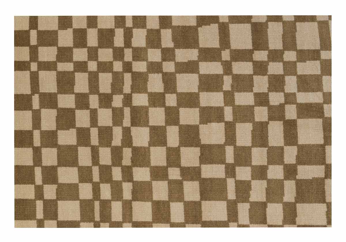 close up of taupe chess rug. checkered tan and brown pattern.