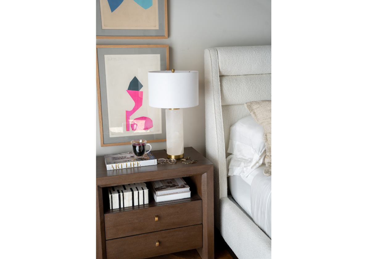 the mille nightstand next to a bed with the domino keys box inside of one of it's shelves.