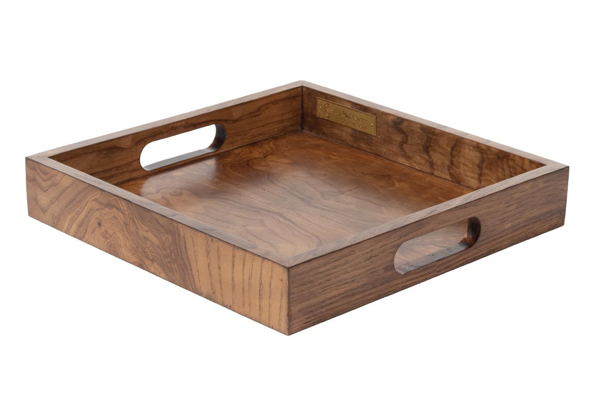side photo of small square ash burled tray.