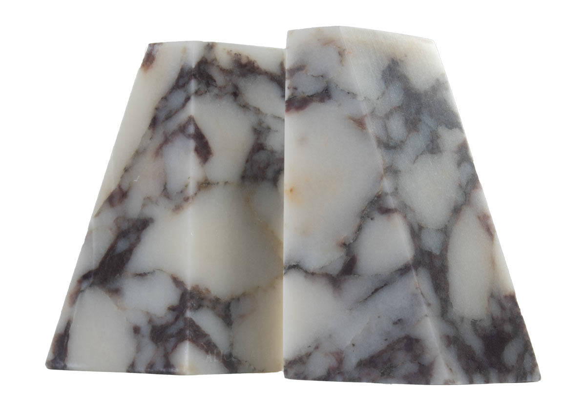 Upclose picture of marble bookends made in calacatta viola.