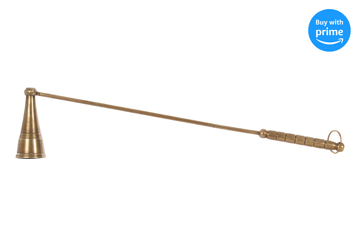 antique brass candle snuffer pictured to the left.