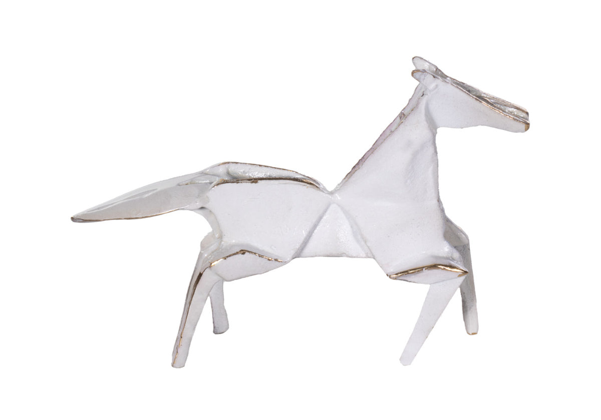 A majestic animal known for its strength, courage, freedom, and above all nobleness, this petite brass horse makes a powerful statement. Display in any decor setting or give as an elegant, symbolic gift.