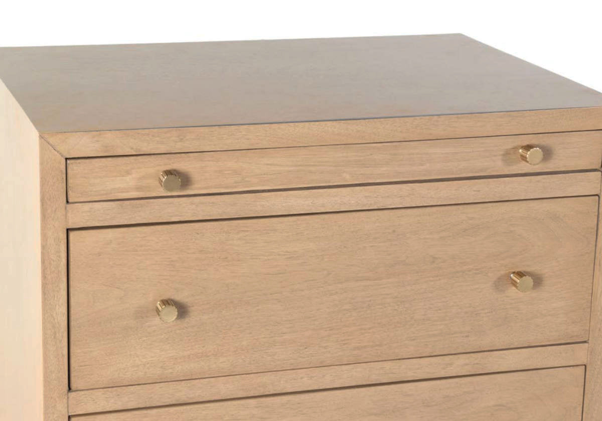 close up picture of the small brooklyn dresser with gold knobs.