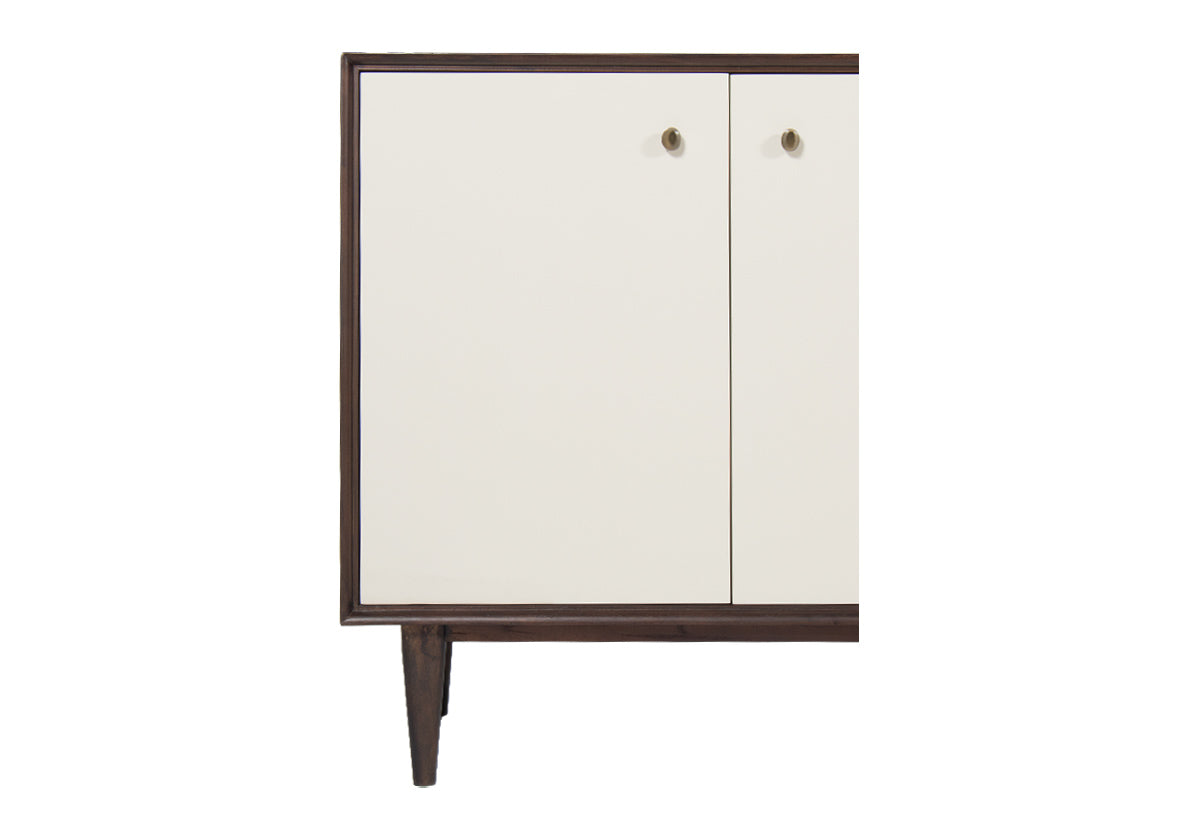 closeup photo of francis sideboard bone white doors against a dark mahogany wood frame.