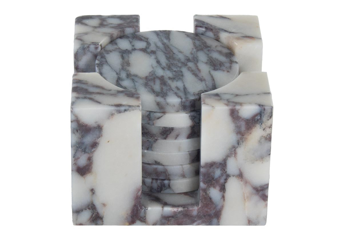 close up photo of marble coaster set. made of calacatta viola marble.