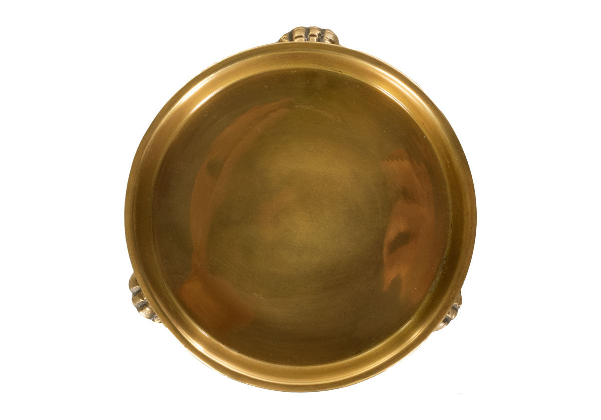 An Alice Lane favorite, this round clawfoot dish is crafted from brass and steel. Its eye-catching lion paw legs represent strength and leadership with balanced thought, action, and emotion. Incredibly versatile, it easily styles as a catchall, candle dish, or decor piece. Its symbolic meaning makes a luxurious, thoughtful gift for anyone.