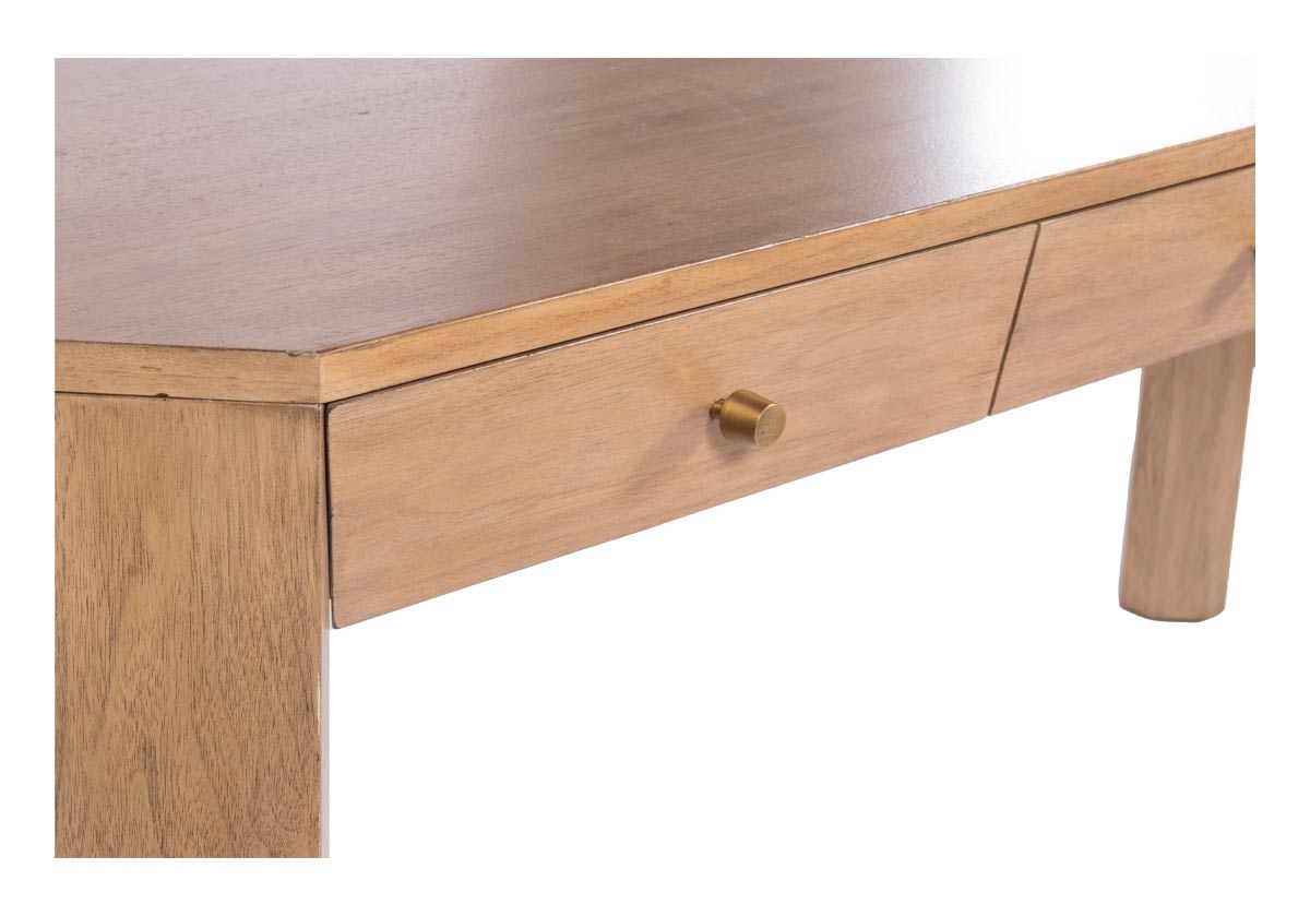close up  of The Brooklyn Desk showcases a beautiful bleached walnut finish set on a walnut composite base. Its clean-lined from is subtly contrasted by angled drawers with petite bronze knobs for added dimension and sophistication. Easily style at the foot of a bed or in an office for an eye-catching design.
