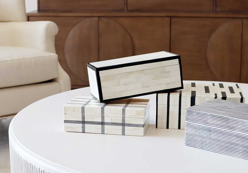 domino keys box shown with 4 other bone boxes.
