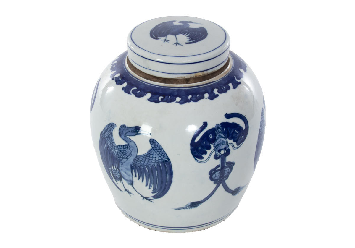 crane temple jar large, seen on white backdrop with floral designs on the sides.