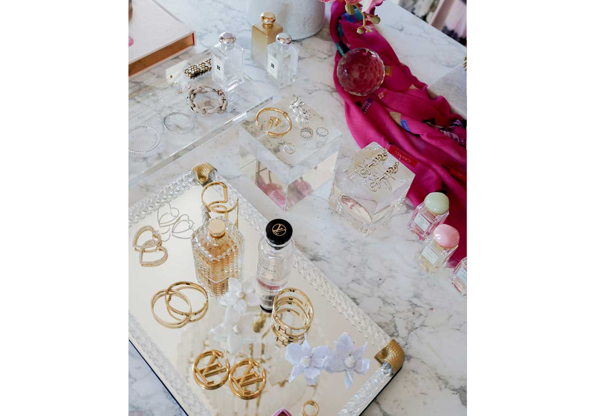 the large and small crystal cubes can be seen the center of the photo, above the tray with jewelry on it.