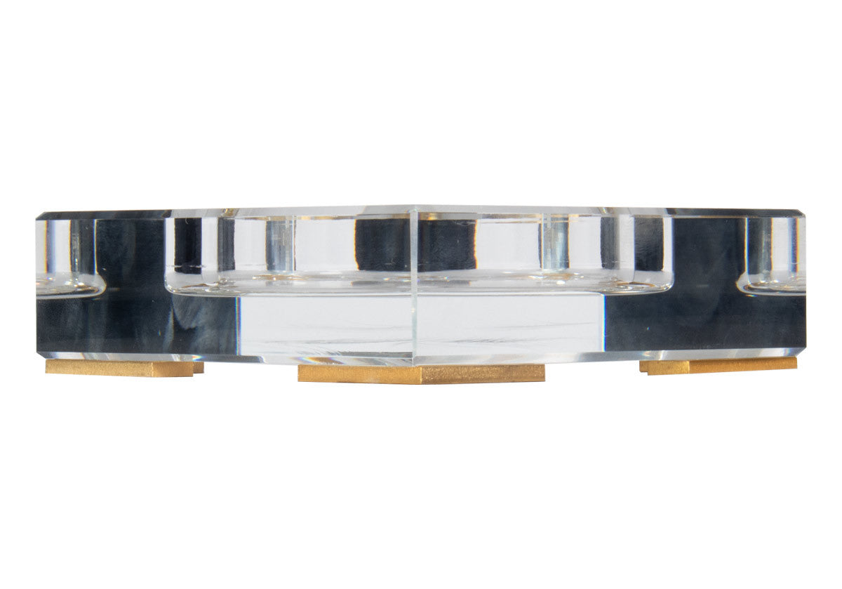 side ways view of the crystal candle diffuser with gold legs on the bottom of it.