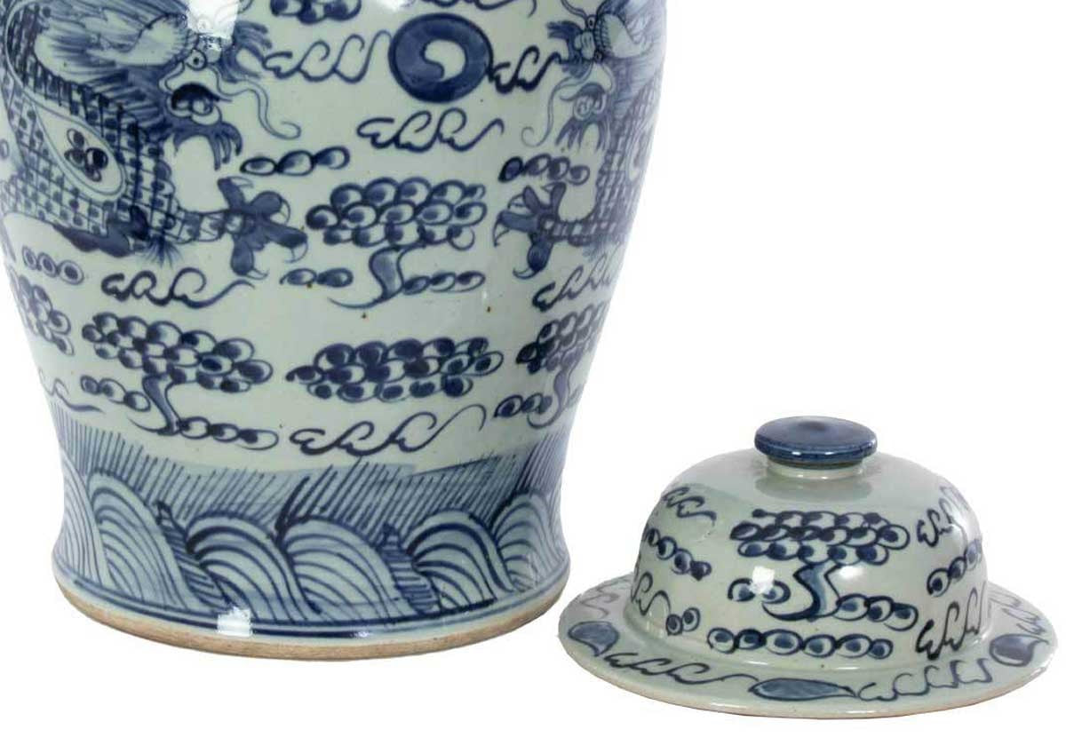 close up of bottom of dancing dragon jar with lid off.