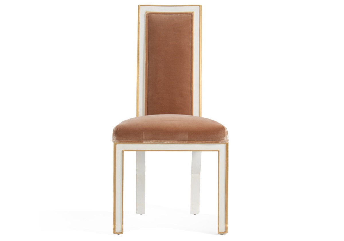 Make a statement with the beautifully dramatic Felix Chair. Its straightforward silhouette is accentuated by its elongated back and incredibly soft antiqued terra mohair upholstery. A smooth white finish outlined in gold further elevates its striking design. Display one as a focal point or style multiple around a table for an added look of luxury. 