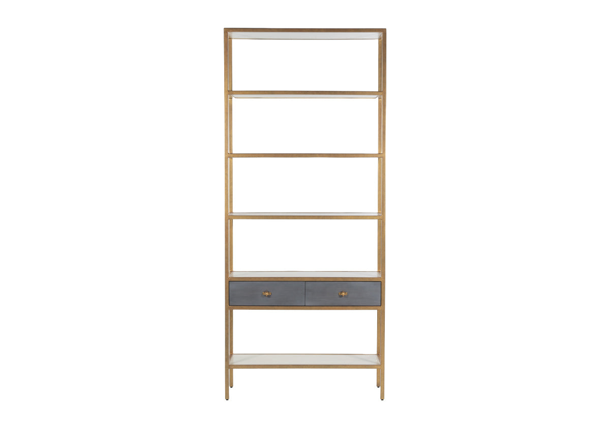 tall, slender, brass etagere with gray drawers 