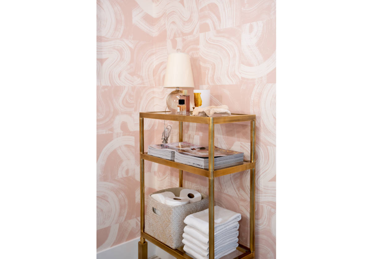 lifestyle shot of the beatrice etagere in a bathroom setting with the penny lamp on top.