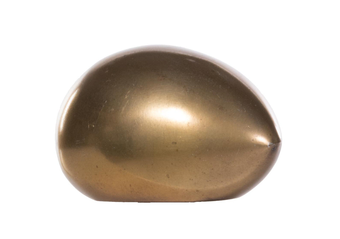 An eternal symbol of purity, hope, fertility, and the rare gift of luck and wealth, this solid brass egg is a beautiful addition. Give as a thoughtful gift or display on built-ins, coffee tables, or consoles for an interesting addition.