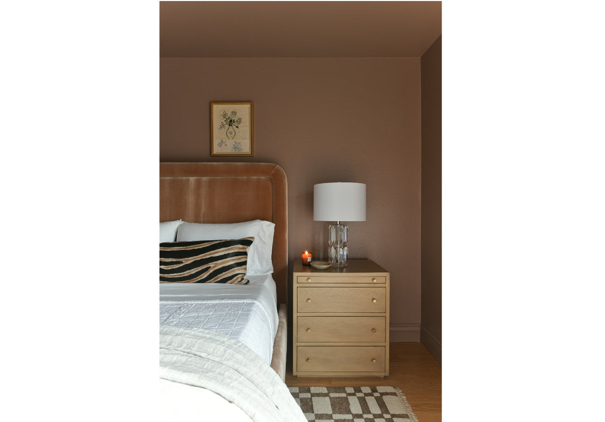 the brooklyn small dresser can be seen in a bedroom setting with the kir bed and the chess rug. 