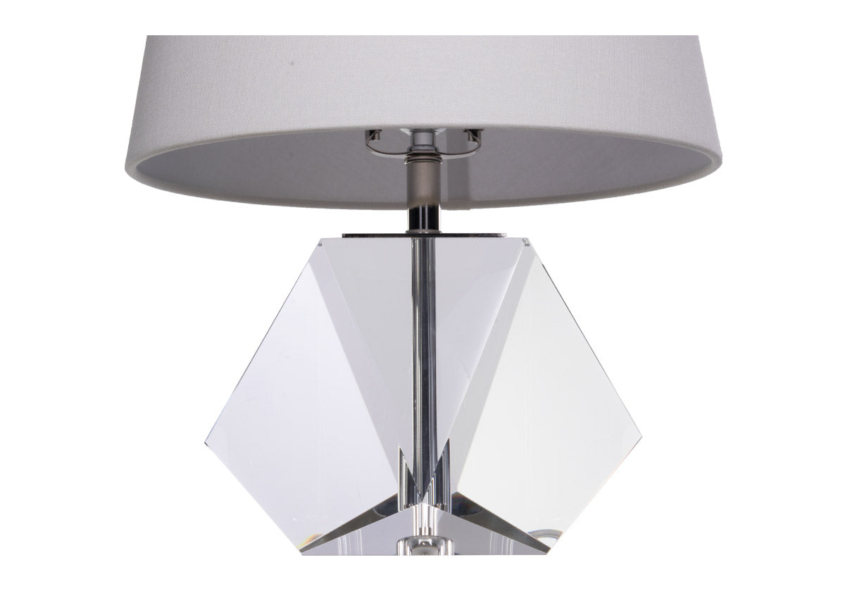 the birdie lamp has a solid K1 crystal base, petite size, and round linen shade.