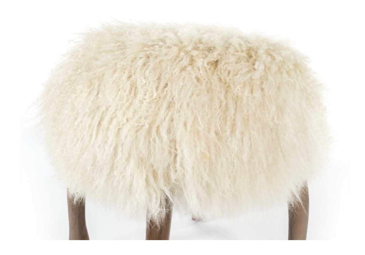 close up of mongolian sheep fur, the fifi stool. 