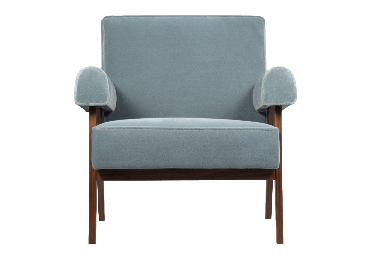 a walnut-stained chair for living room complemented by comfortable Capri Blue faux mohair upholstery. blue chair for living room