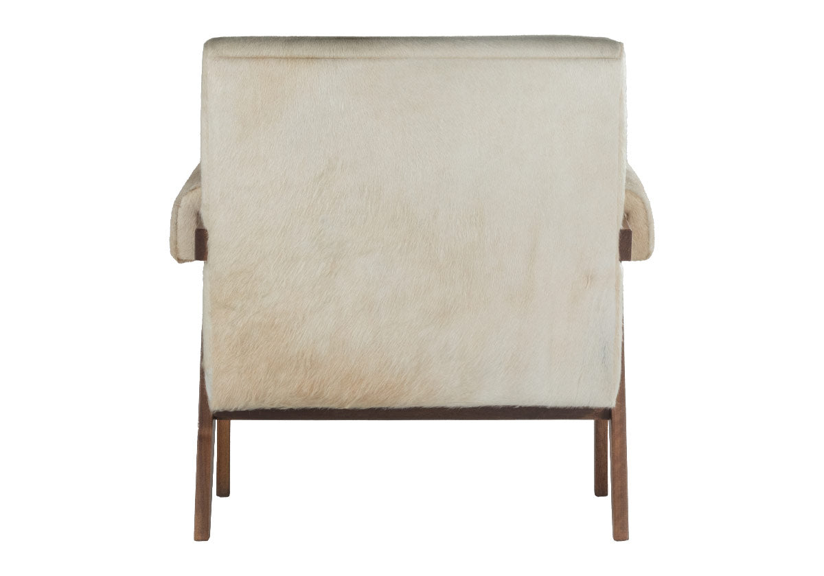 back view of Jude lounge chair showcases a walnut-stained frame complemented by an ultra luxe hair-on-hide upholstery. white and tan cowhide chair