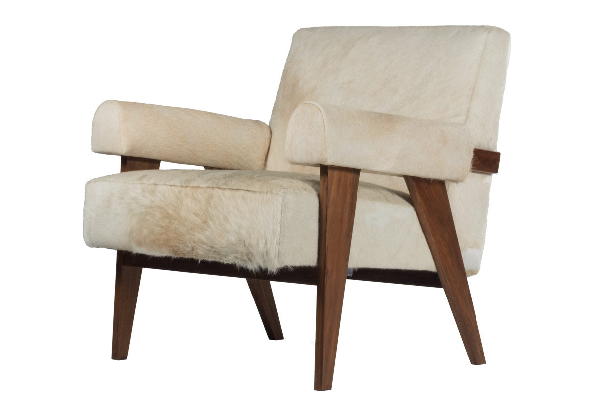 Jude lounge chair showcases a walnut-stained frame complemented by an ultra luxe hair-on-hide upholstery. white and tan cowhide chair