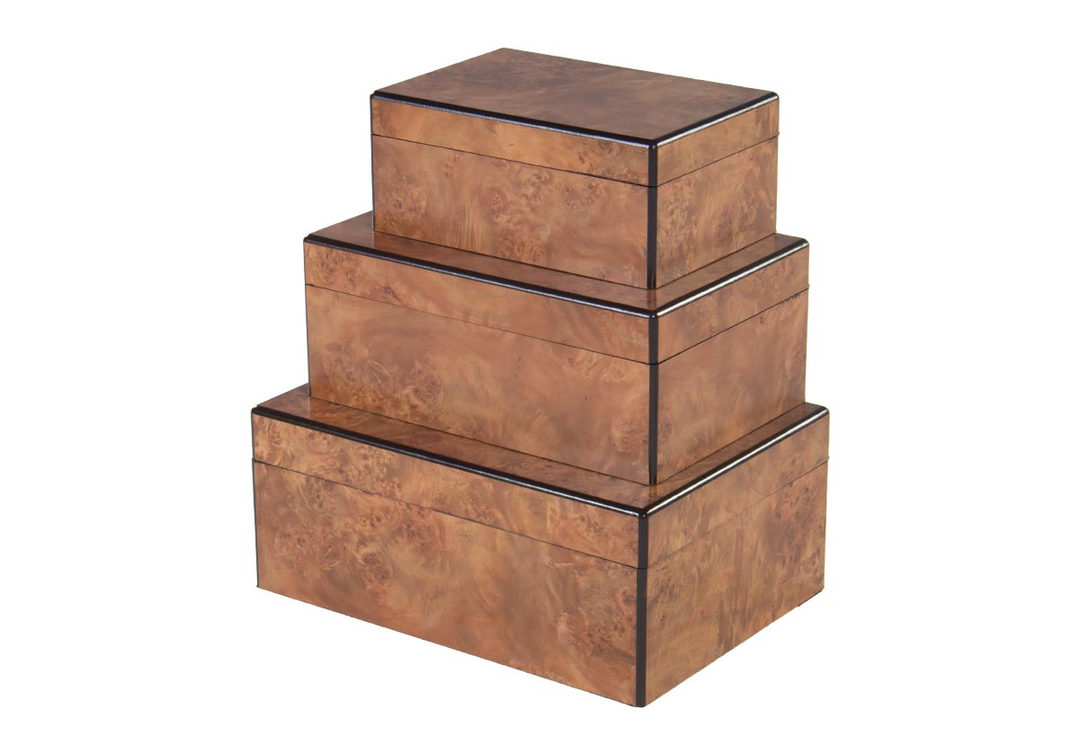 side photo of three matte burled boxes stacked on top of each other. 