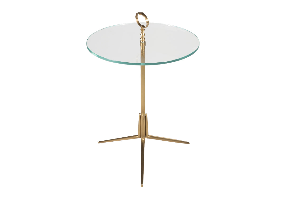 brass side table with round glass and brass detail.