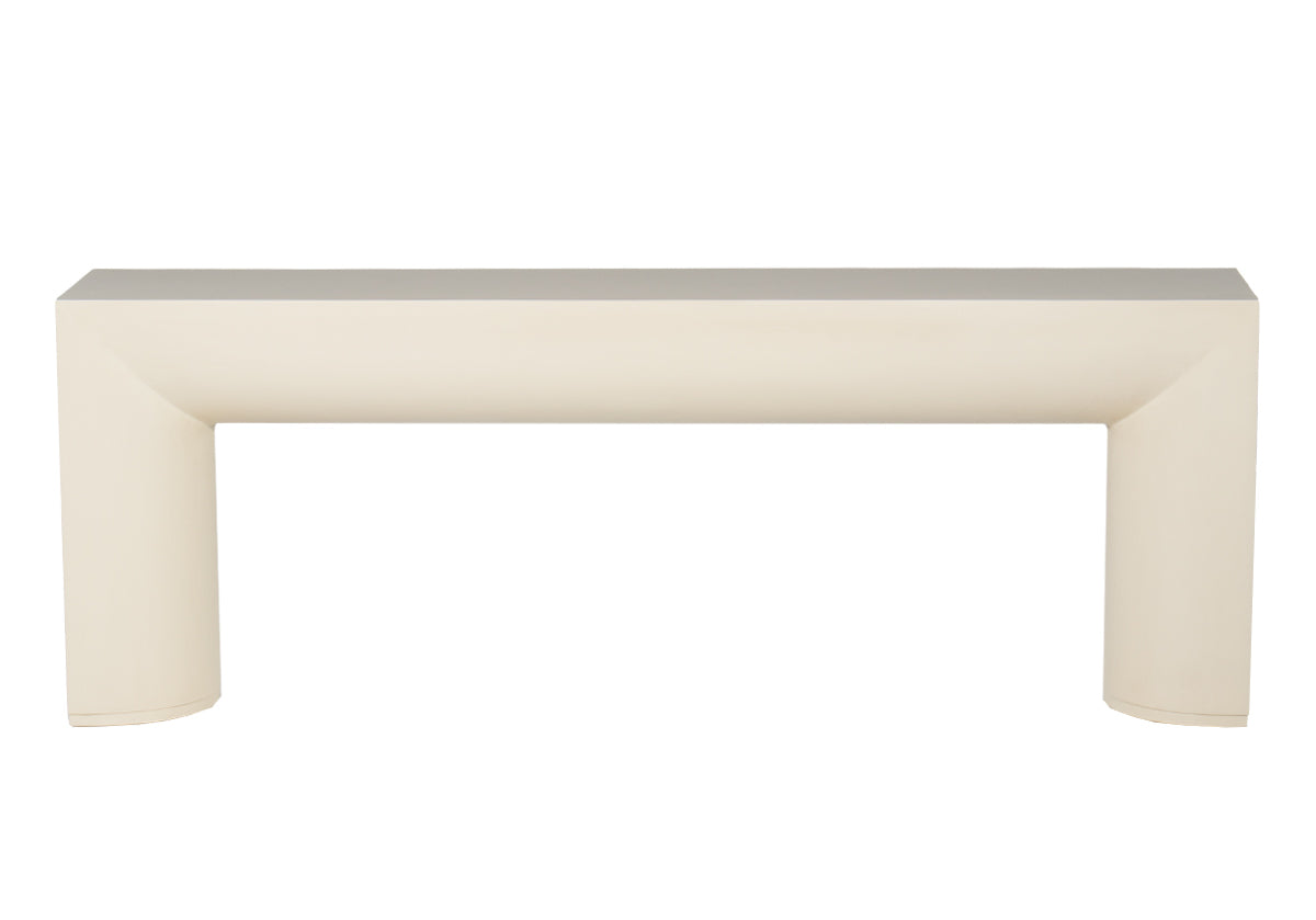 The Sloane Console features a large-scale open design. Its beautiful pairing of crisp, straight lines complements its deep, rounded underside creating balance, and sophistication, with unexpected curves. Its warm, cream color pairs well with a large art or mirror in an entryway or dining room, or style behind a sofa or sectional for an incredible addition.