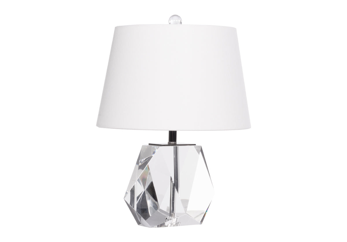 the birdie lamp has a solid K1 crystal base, petite size, and round linen shade.