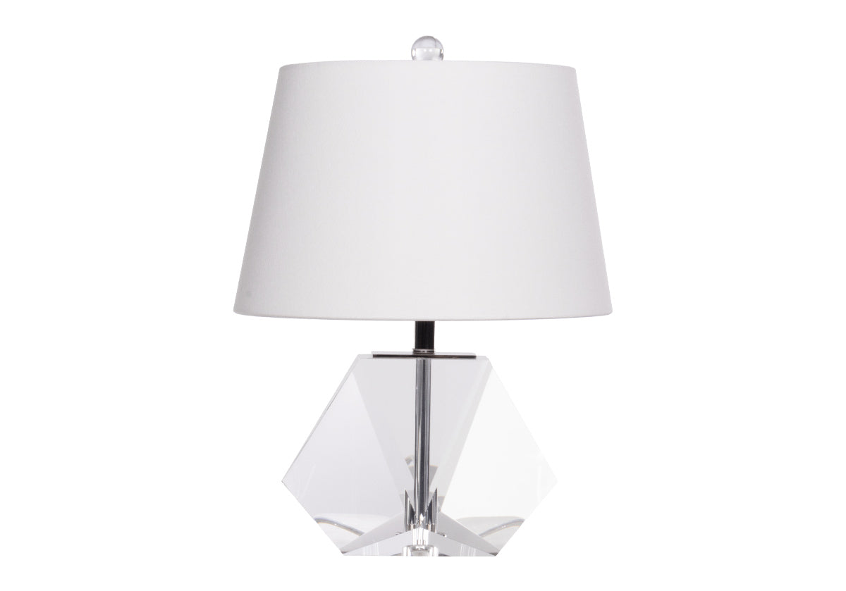 the birdie lamp has a solid K1 crystal base, petite size, and round linen shade.