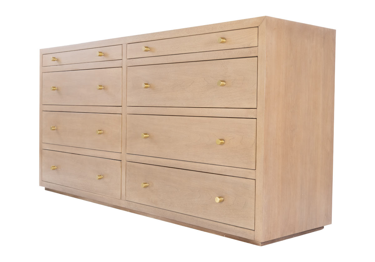 product photo of the walnut bleached wood of the brooklyn dresser with gold knobs.