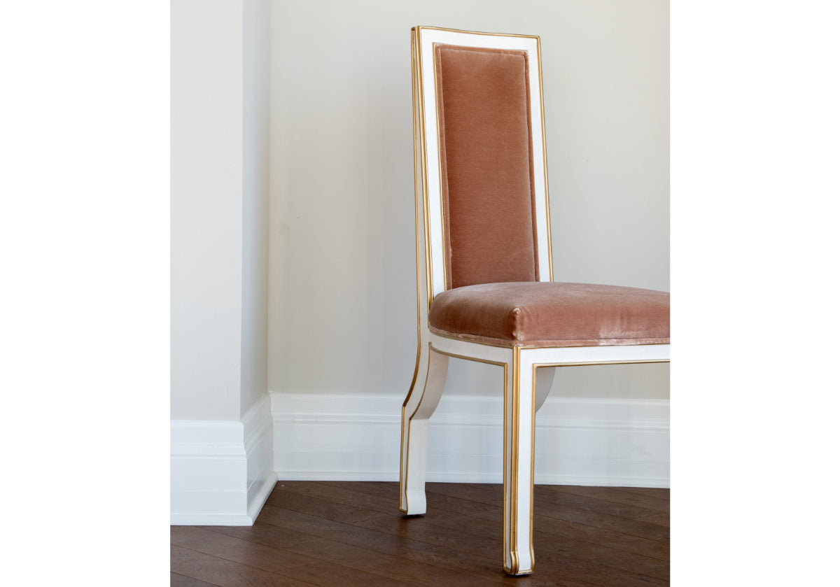 felix chair can be seen in a white room. 