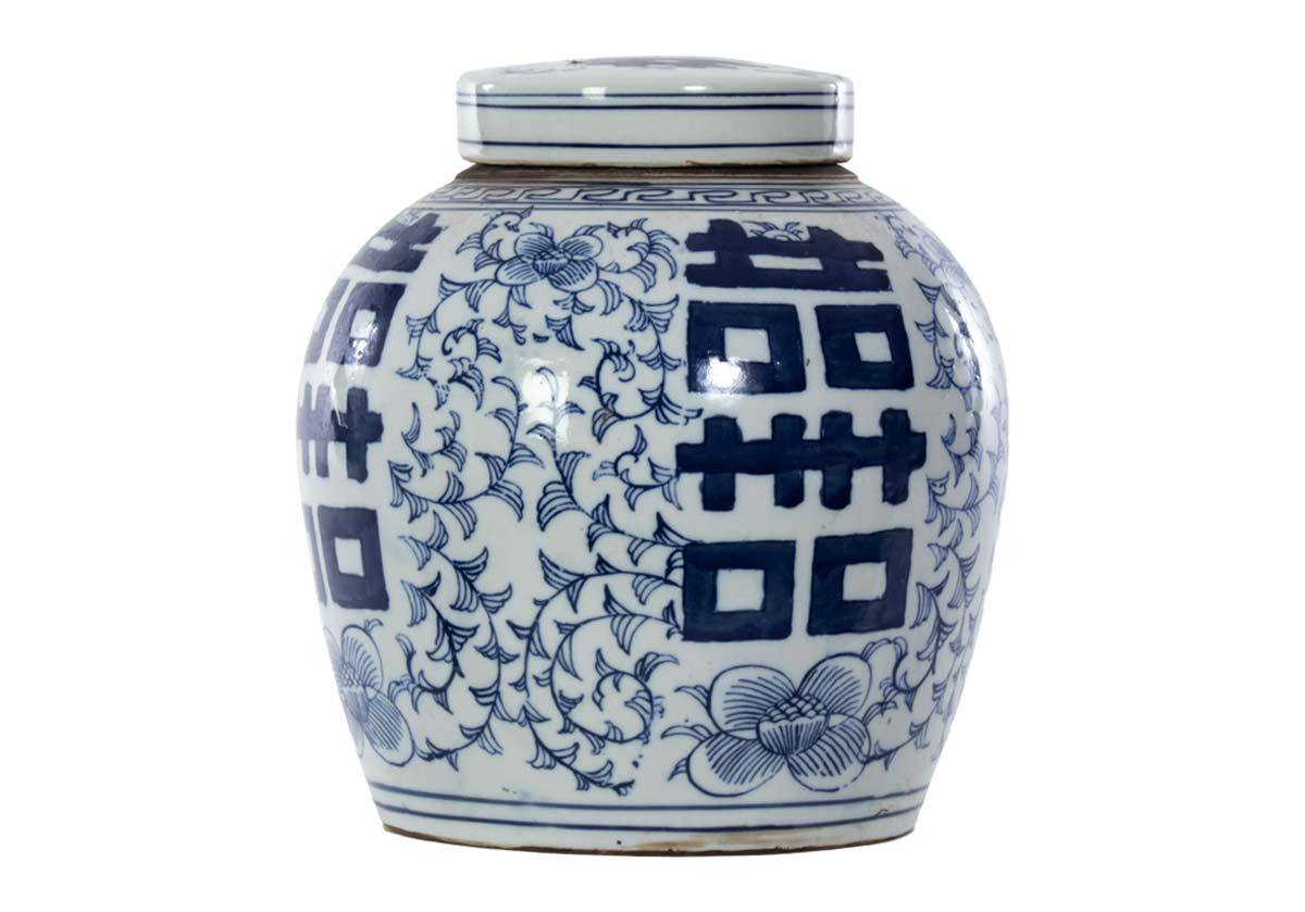 Create a tasteful, cultured look with this rounded temple jar. It boasts large painted symbols offset by delicate flowers, intricate stems, and lined patterns. Its traditional blue and white coloring styles beautifully with faux stems and greenery, lending a fresh, versatile design.&nbsp;